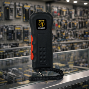 EZ Trigger Stun Gun on top of glass case in security products store
