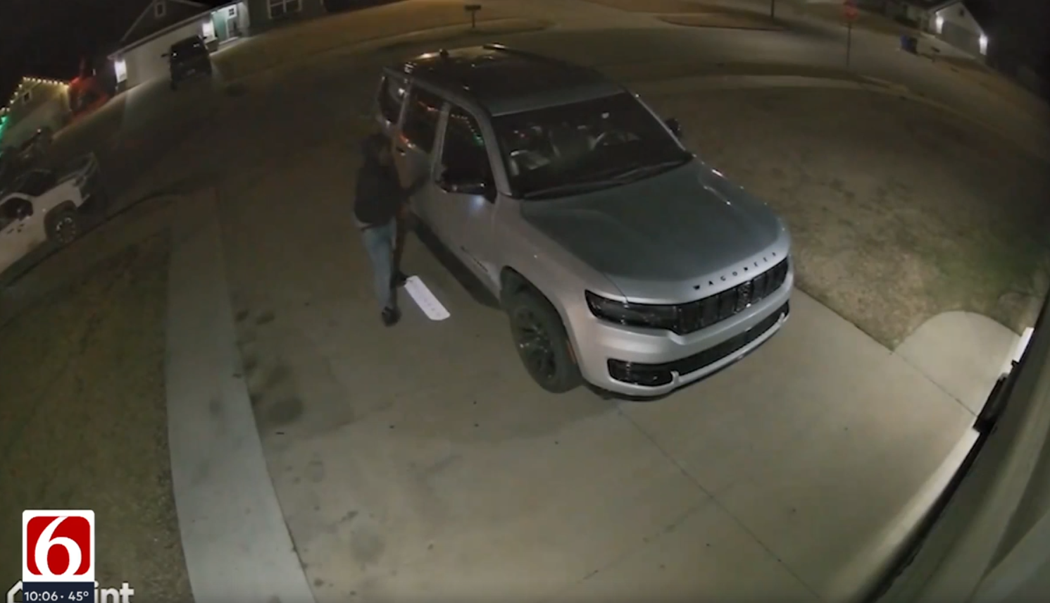 screen grab showing News on 6 logo and car thief walking around vehicle in driveway